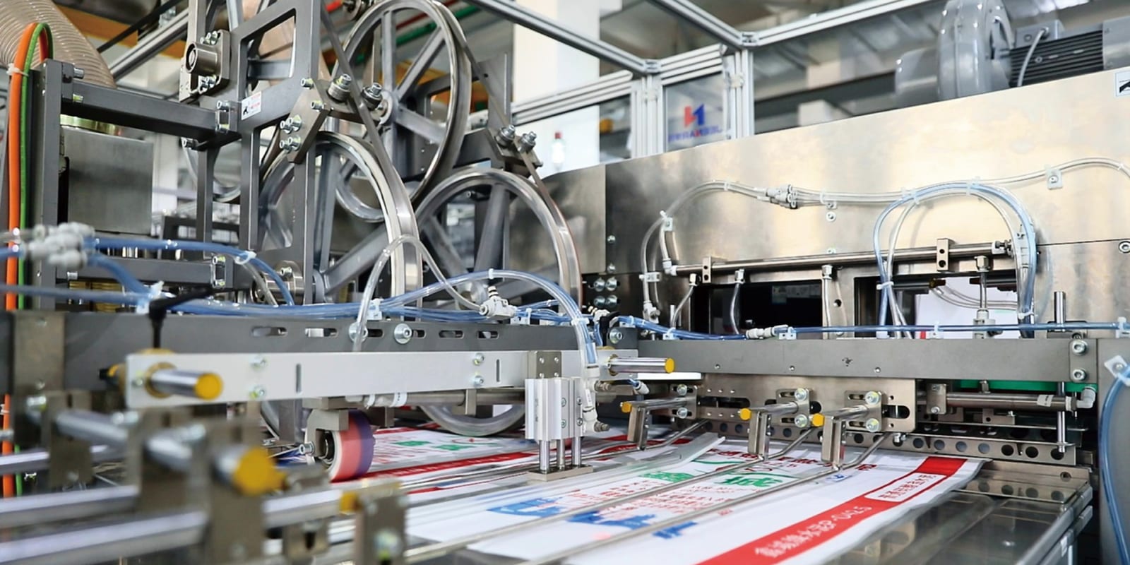 Recycling and reprocessing line with printed web running through